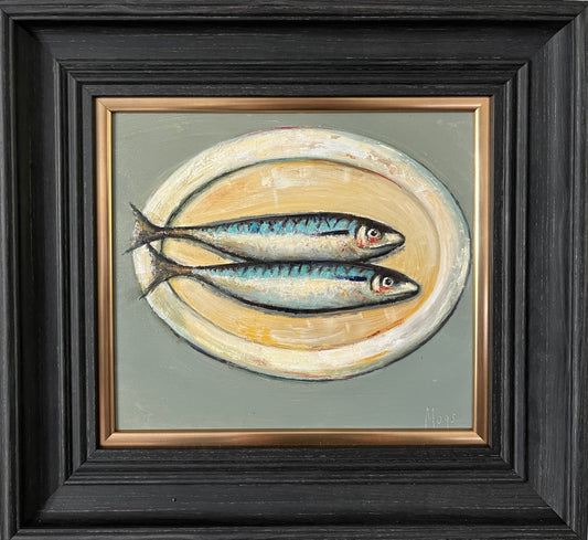 Two mackerel on a plate